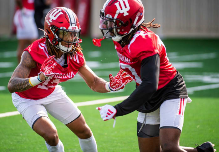Indiana's Nic Toomer (15) defends Indiana's Tyrik McDaniel (17) during Indiana football fall camp at the practice fields on Friday, Aug. 11, 2023.